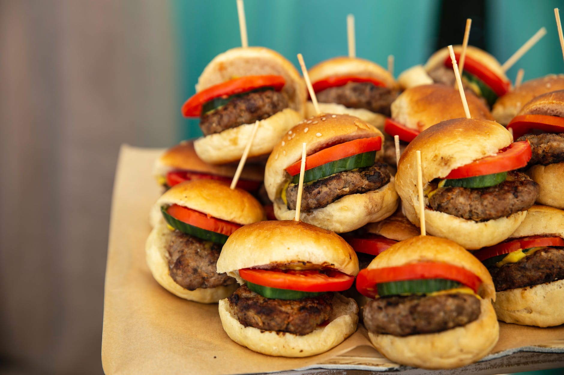 selective focus photography of pile of burgers