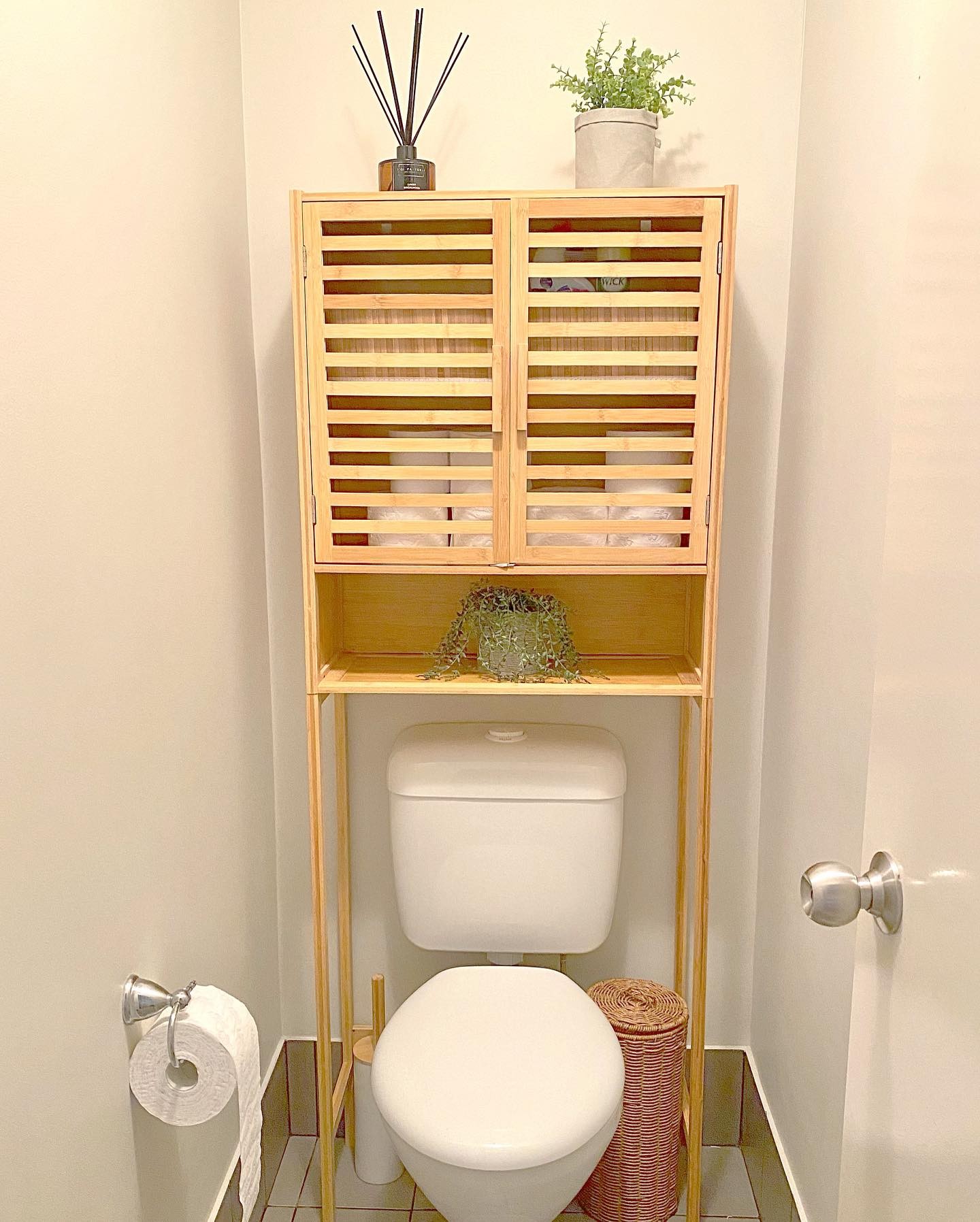 Plain Behind Toilet Decor With Bamboo Shelf